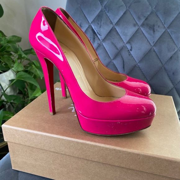 Christian Louboutin Shoes - has some small nicks on toes and bottoms are used still very good condition.